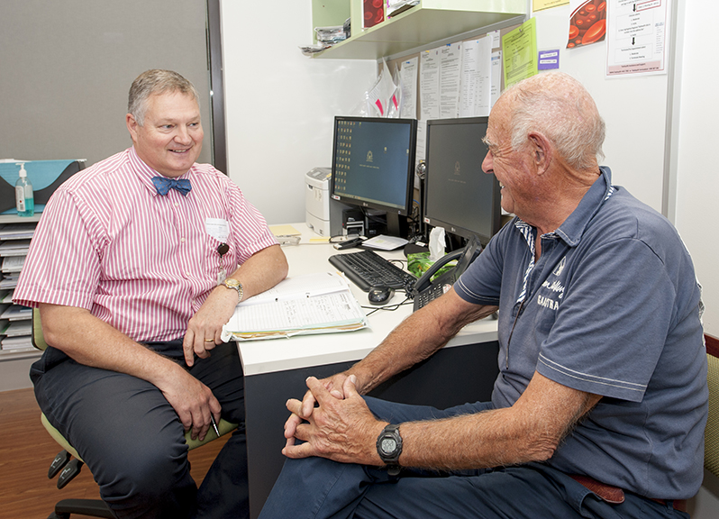 Dr Joske with a patient