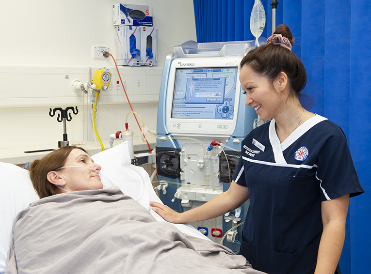 Nurse caring for a female patient